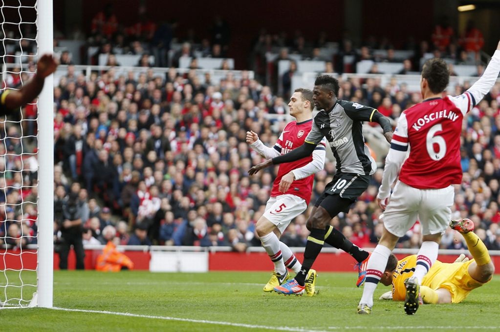 Emmanuel Adebayor scores for Tottenham Hotspur against Arsenbal, November 2012