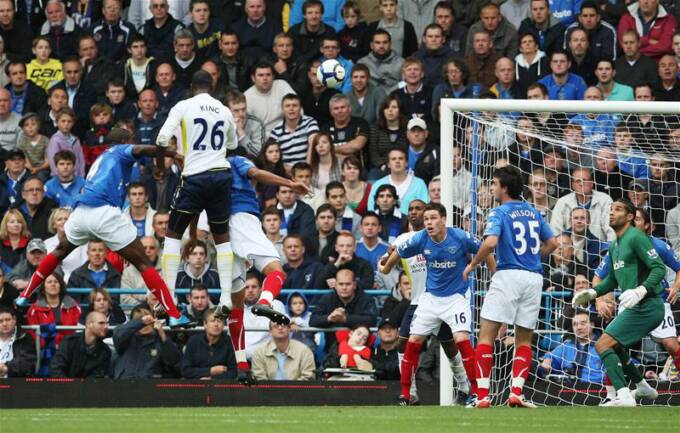 Ledley King scores Tottenham's first goal at Fratton Park against Portsmouth