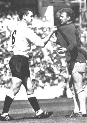 Dave Mackay empasises a point to Billy Bremner