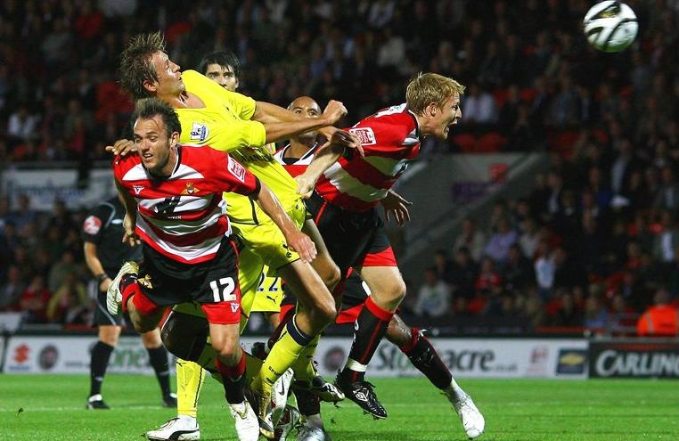 Peter Crouch scores in Tottenham's 5-1 League Cup win at Doncaster Rovers