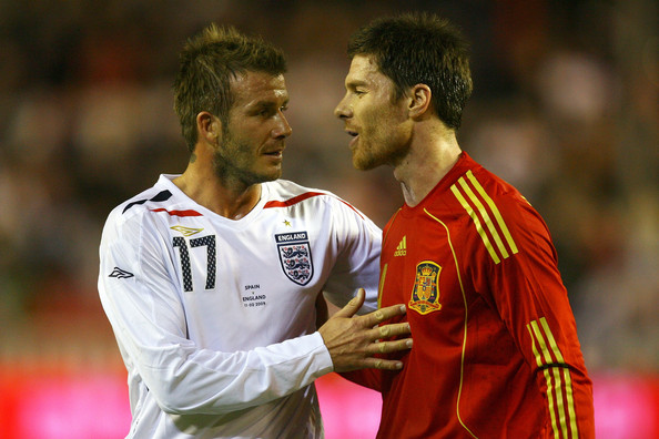 England's David Beckham & Spain's Xavi Alonso