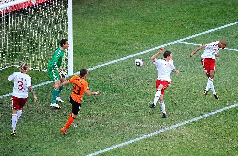 Denmark's Daniel Agger scores an own goal against the Netherlands
