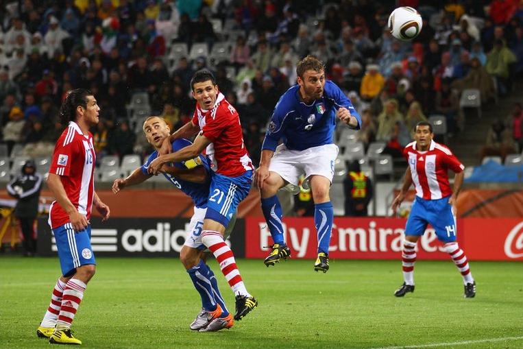 Daniele De Rossi scores Italy's equaliser against Paraguay
