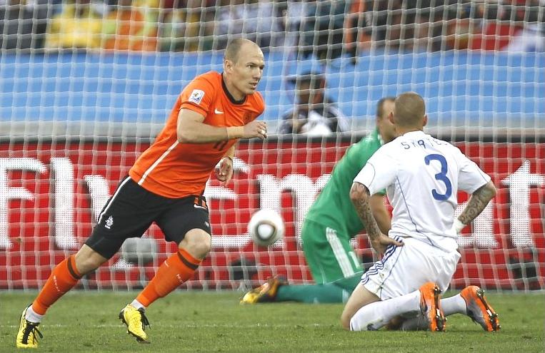 Arjen Robben scores for the Netherlands against Slovakia