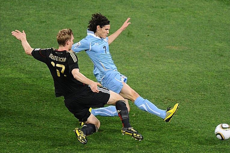Edinson Cavani scores for Uruguay against Germany in the Third Place Play-Off