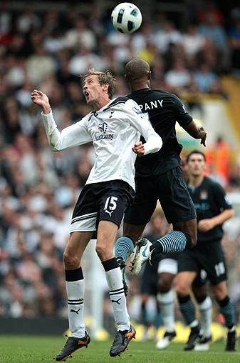 Peter Crouch in action against Manchester City