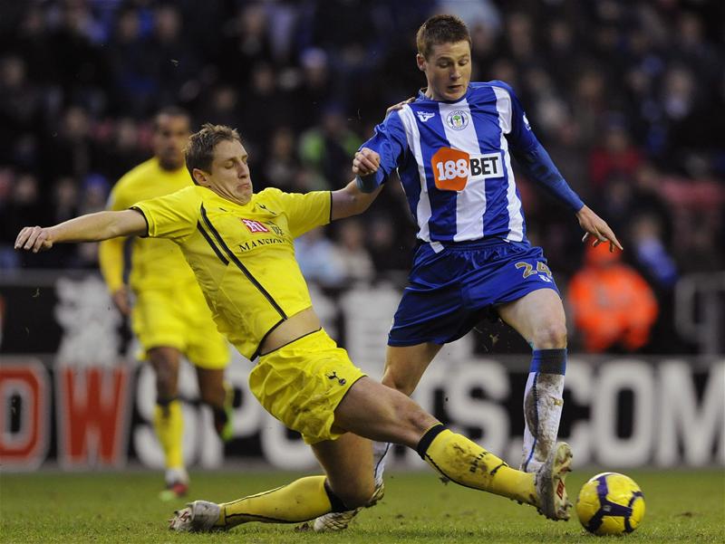 Michael Dawson in action for Spurs against Wigan Athletic