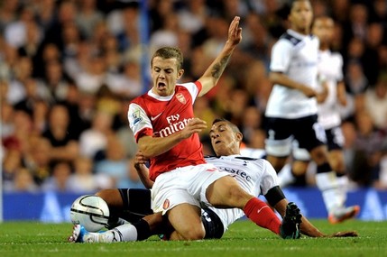 Jake Livermore gets the better of Arsenal's Jack Wilshere