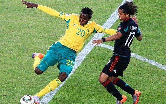 Bongali Khumano & Giovani Dos Santos in 2010 World Cup Finals action in South Africa