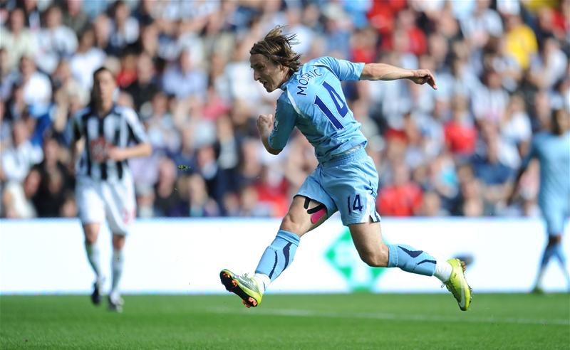 Luka Modric of Tottenham Hotspur scores against West Bromwich Albion, September 2010