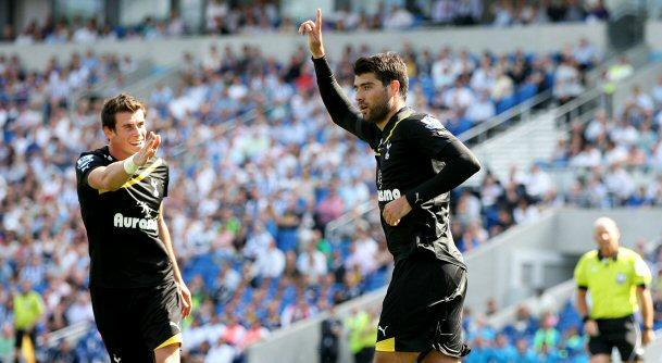 Gareth Bale congratulates Vedran Corluka's goal for Sours against Brighton, July 2011