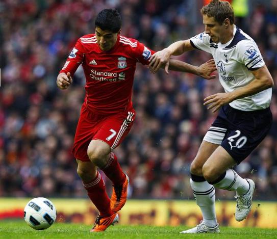 Michael Dawson in action for Spurs in the 2-0 win at Anfield, May 2011