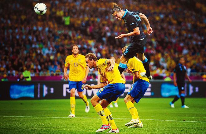 Andy Carroll scors for England in the 3-2 Euro 2012 win against Sweden, June 2012