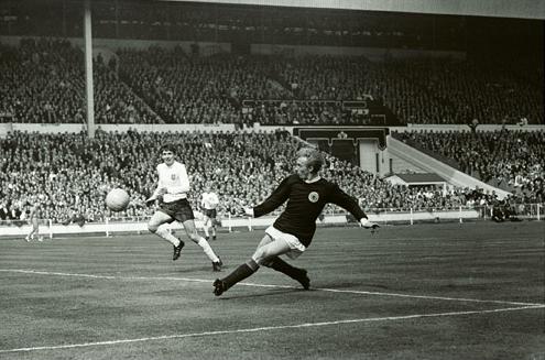 Scottish legend Denis Law in action at Wembley against England