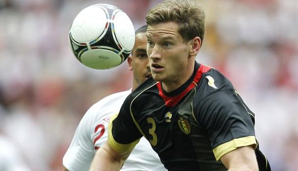 Belgium's Jan Verthongen in action against England's Theo Walcott