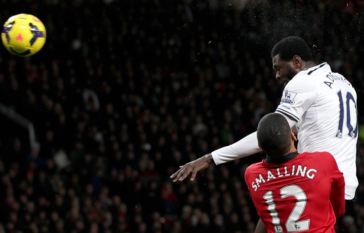 Emmanuel Adebayor scores for Spurs at Manchester United, January 2014