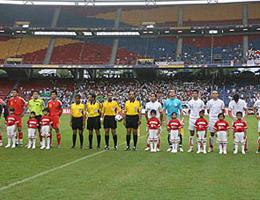 China play Iran during the 2007 Asian Cup at the Bukit Jalil National Stadium, Kuala Lumpur