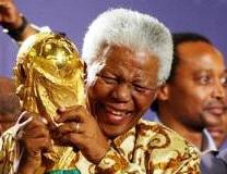 Nelson Mandela with the FIFA World Cup Trophy