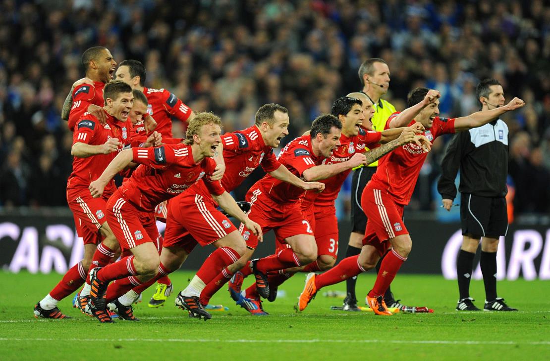 Liverpool celebrate their 2012 Carling Cup penalty shoot-out win against Cardiff City